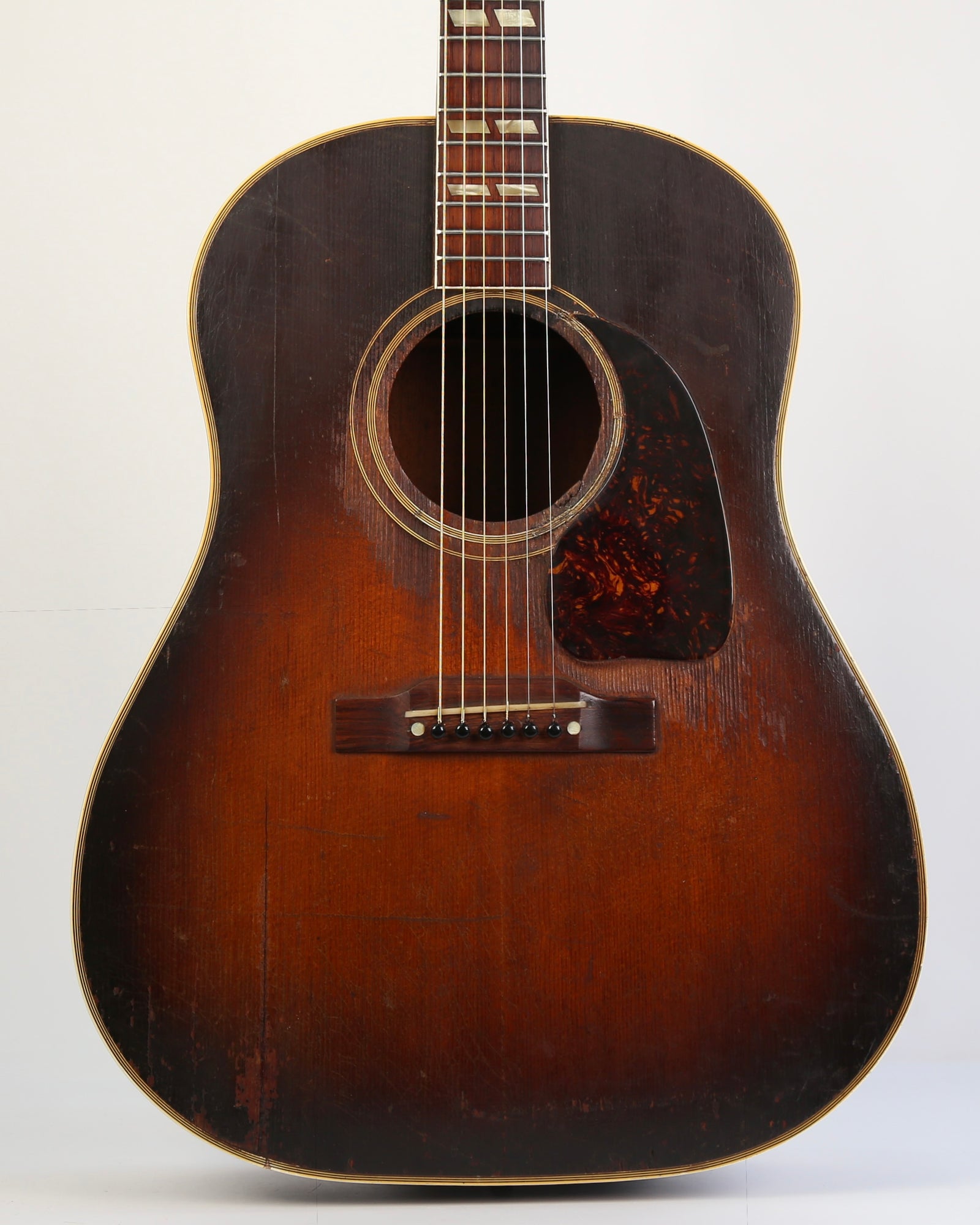 Gibson acoustic guitar sunburst for restoration.
